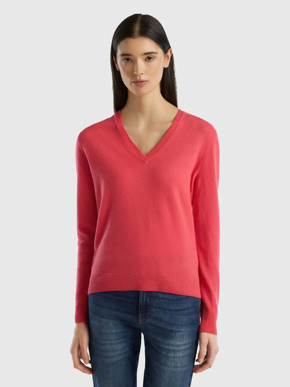 Benetton fuchsia v-neck sweater in pure merino wool. 1