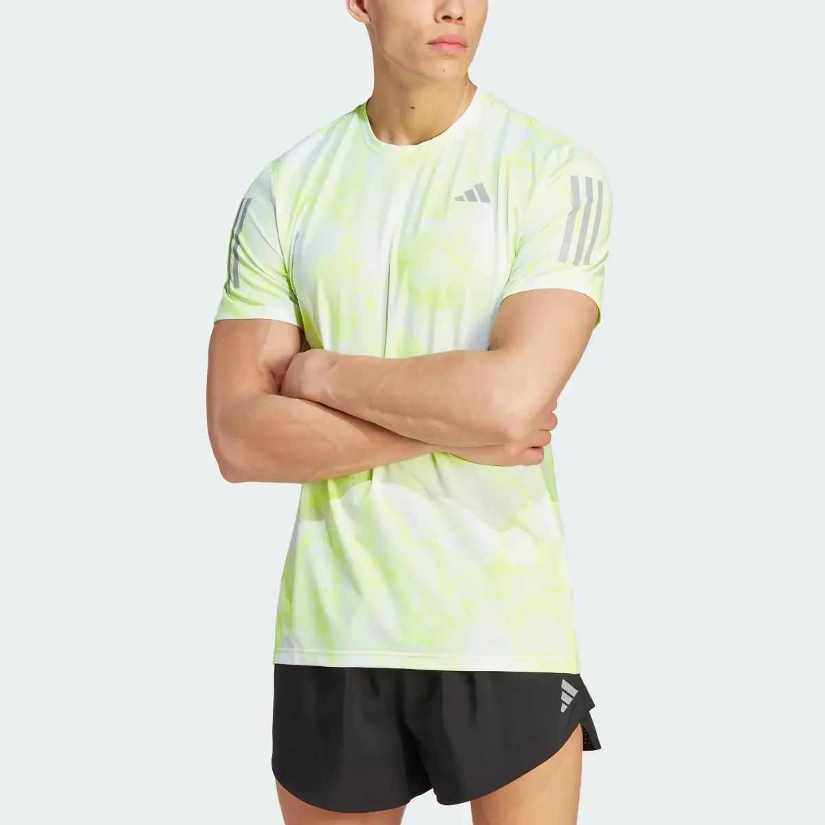 Adidas Own the Run Allover Print T-Shirt. 1
