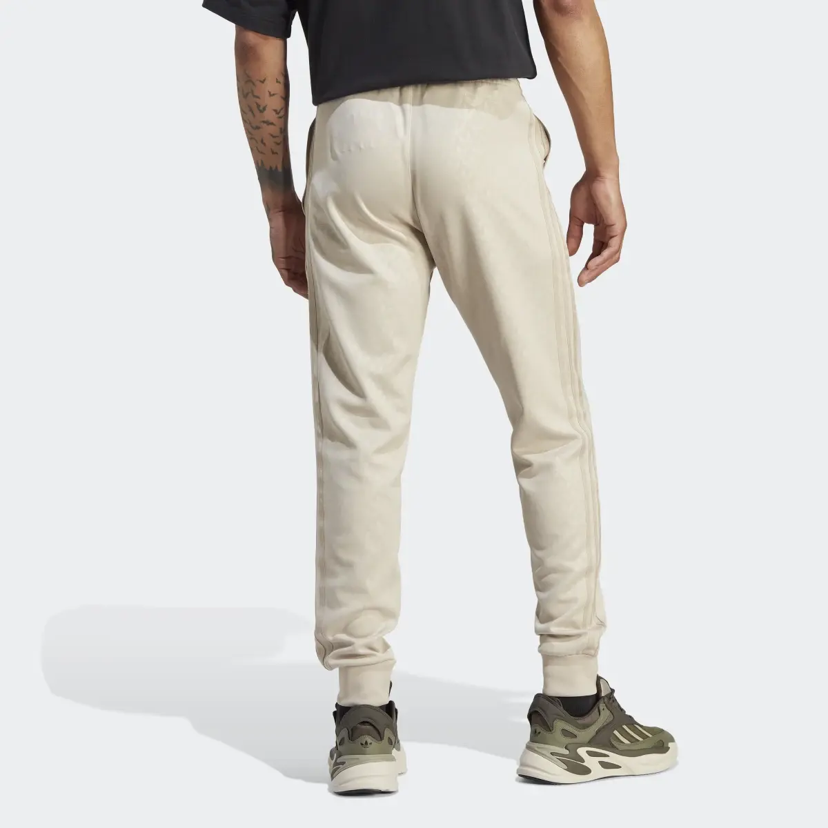 Adidas Pantalon de survêtement à motif monogramme SST. 2