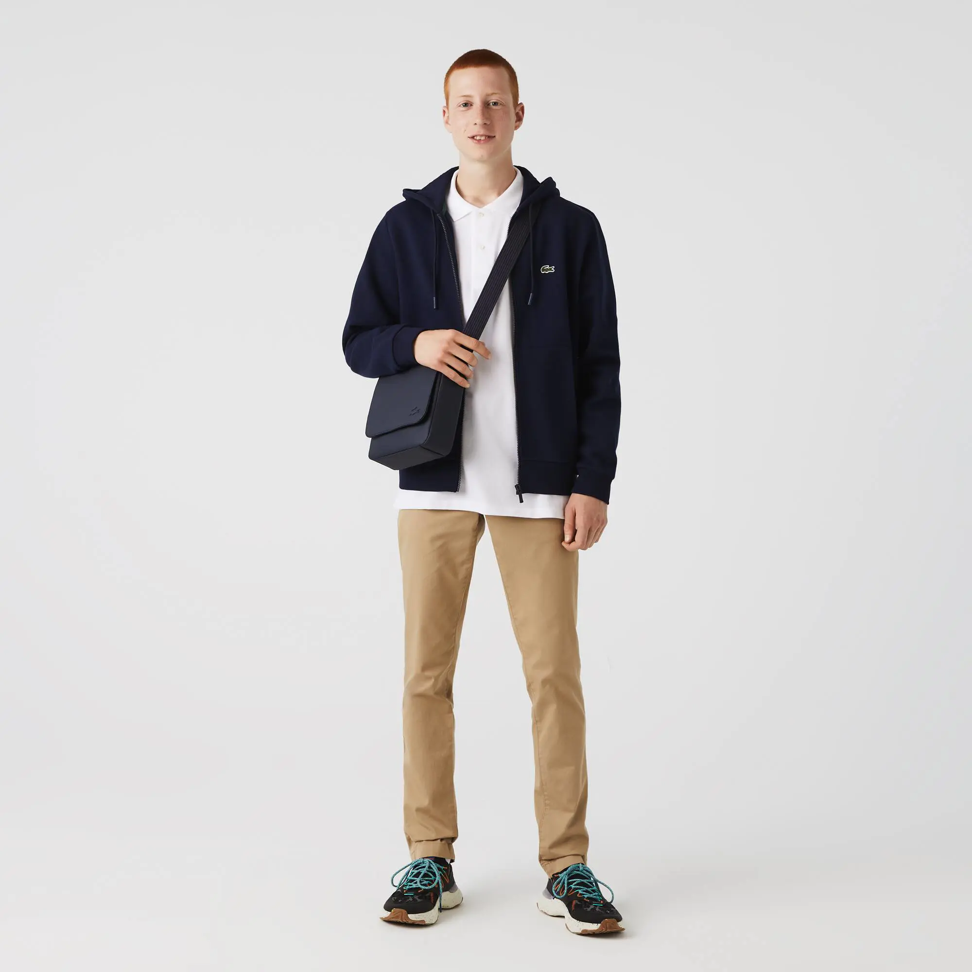 Lacoste Herren-Tasche CLASSIC aus Petit Piqué mit Klappe. 1