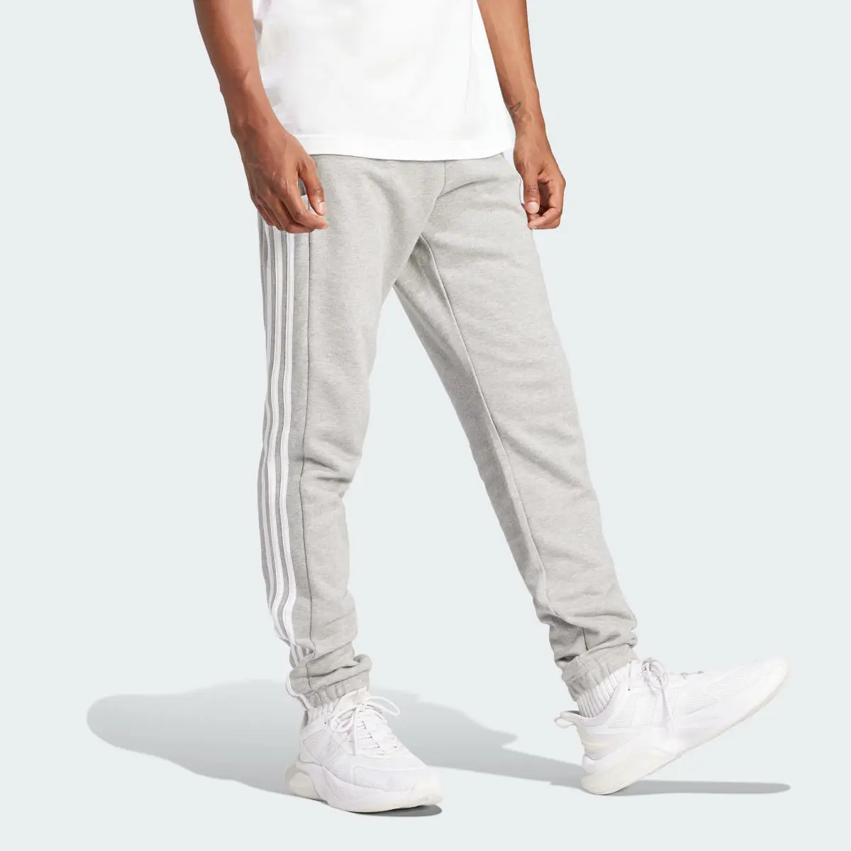 Adidas Essentials French Terry Tapered Elastic Cuff 3-Stripes Joggers. 2