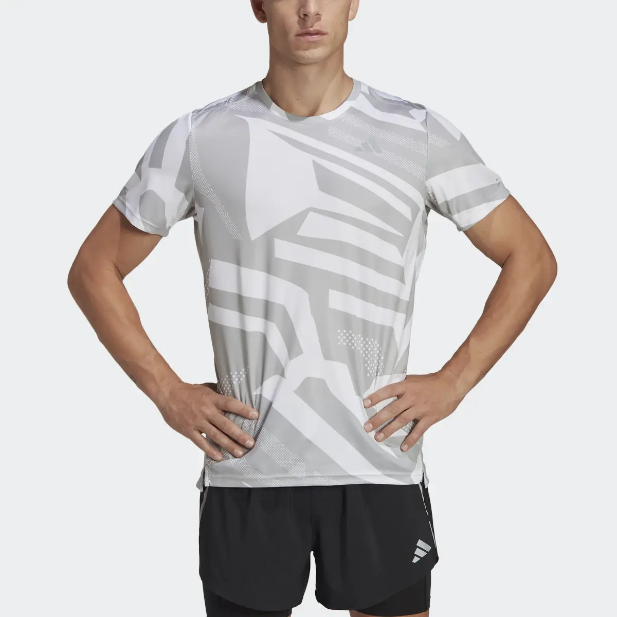 Adidas Own the Run Seasonal Tee. 1