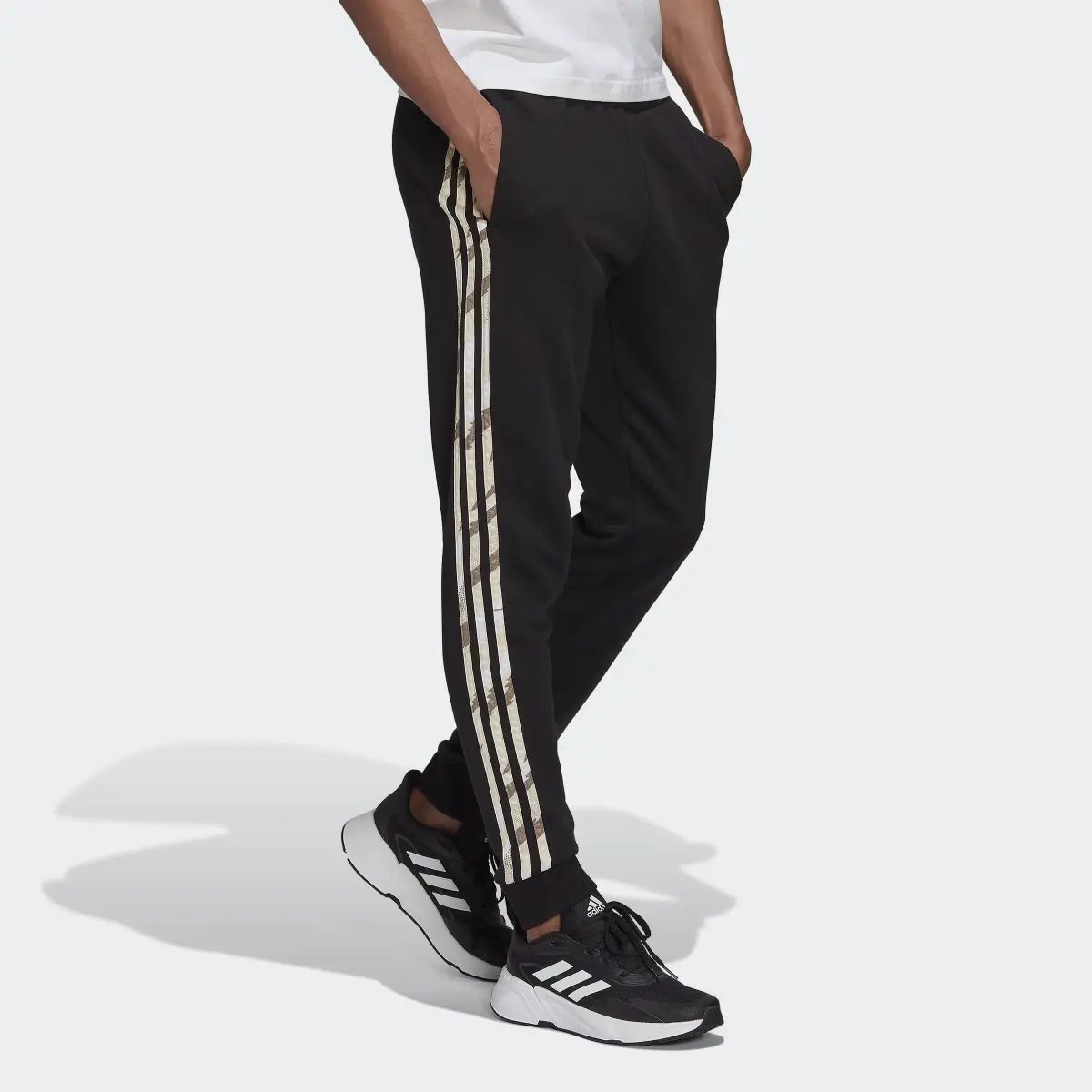 Adidas Essentials French Terry Camo Print Pants. 3