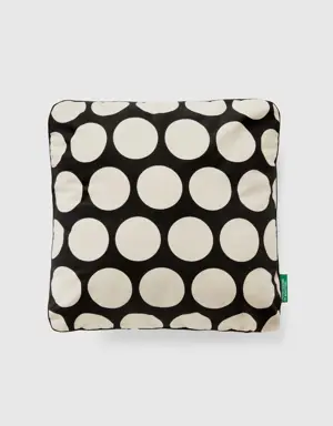 square pillow with white polka dots