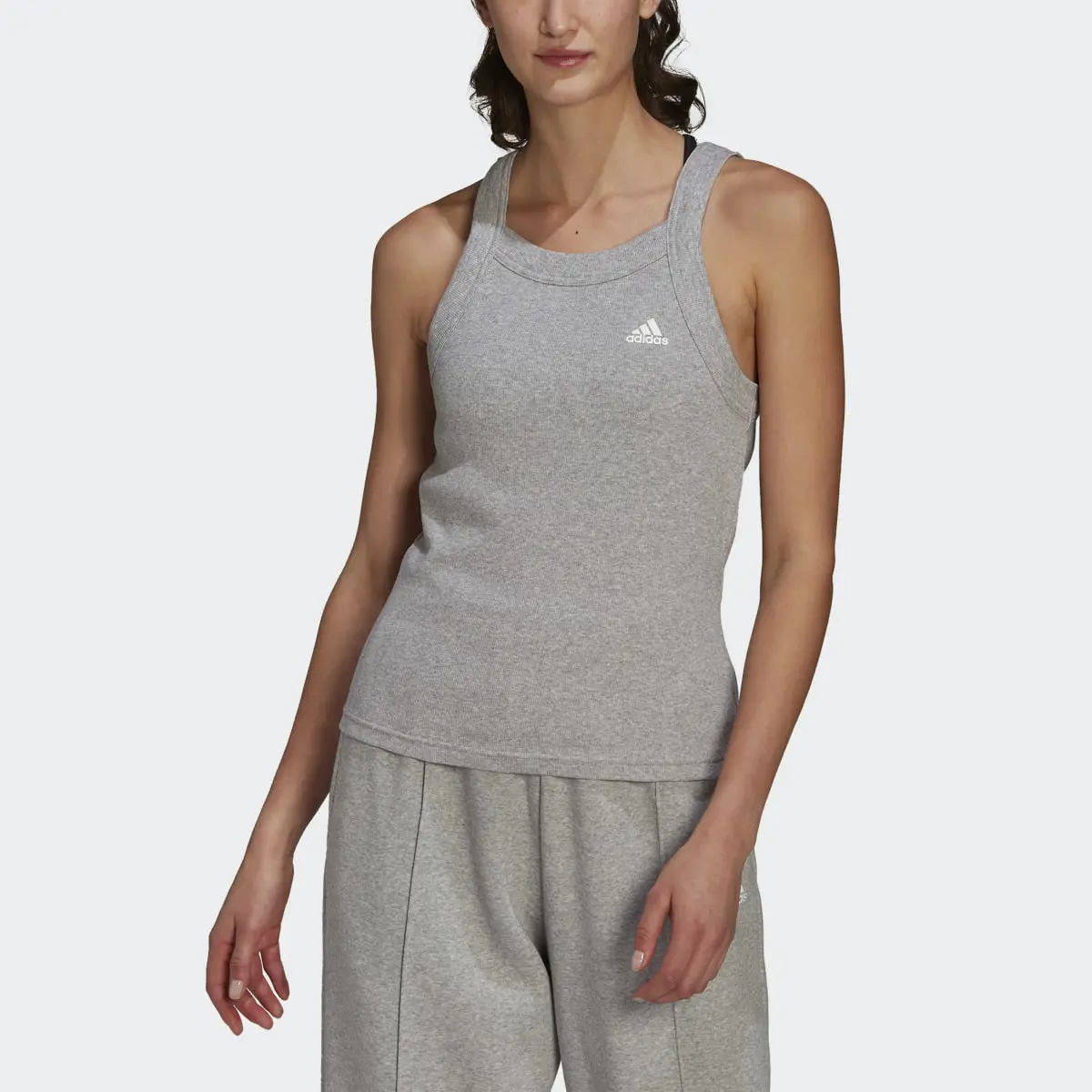 Adidas Playera sin Mangas Essentials Yoga Acanalada. 1