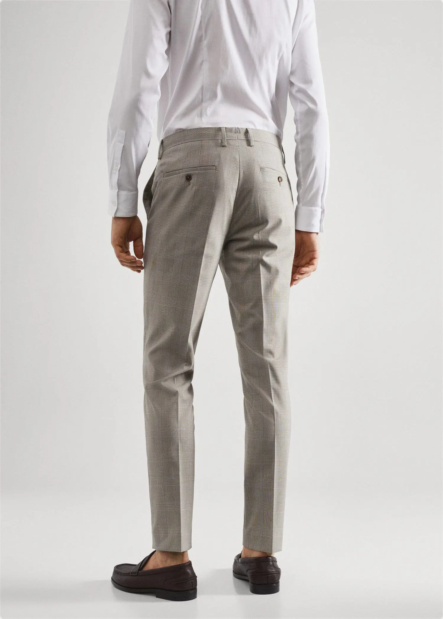 Mango Super slim-fit printed suit trousers. a man in a white shirt and a gray suit 