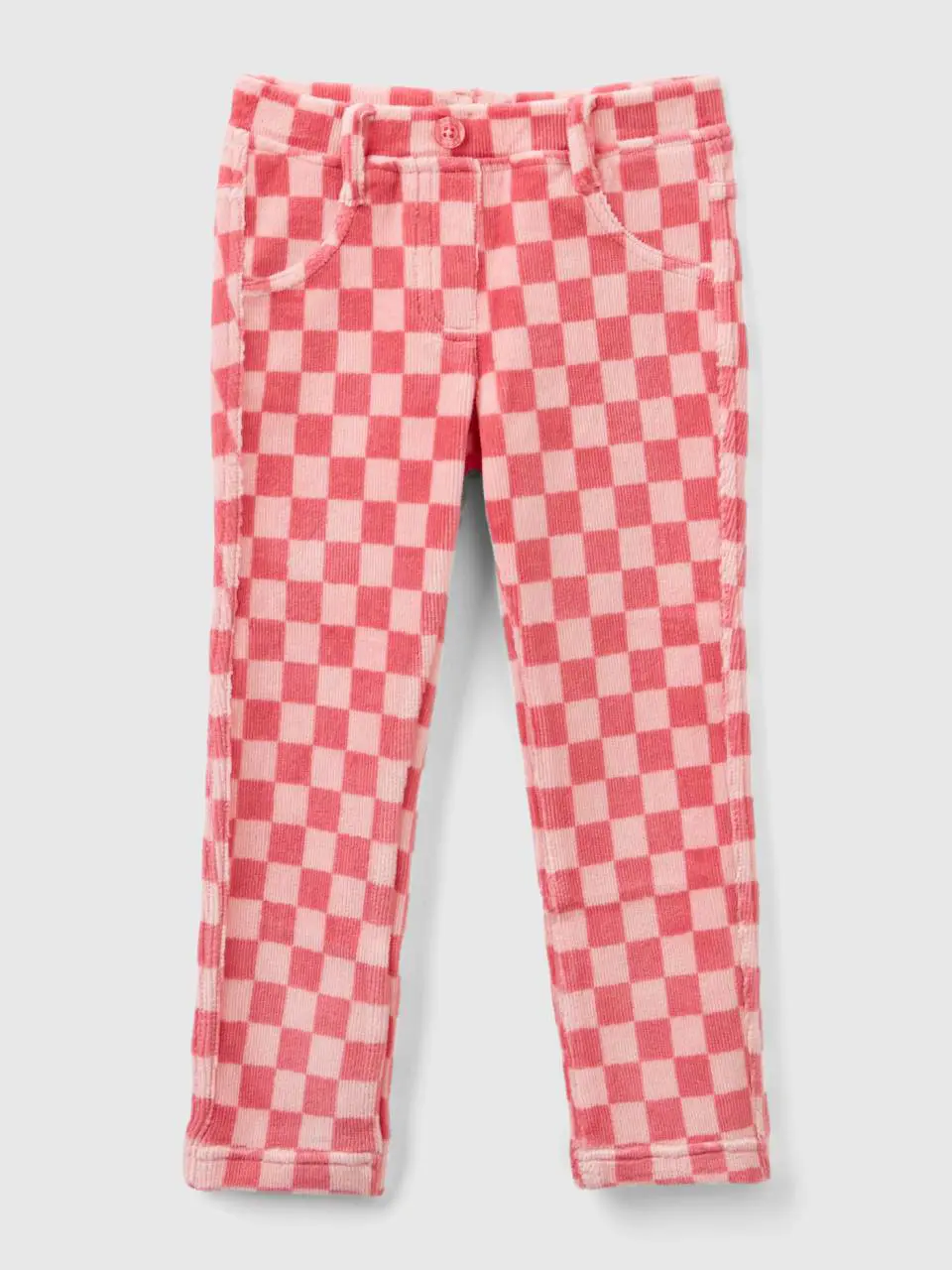 Benetton pink jeggings with checkered print. 1