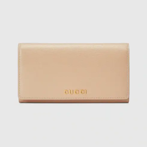 Gucci Continental wallet with Gucci script. 1
