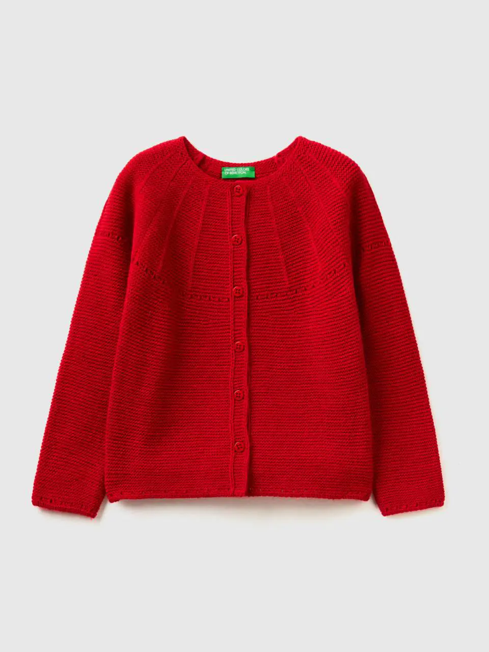Benetton cardigan with perforated details. 1