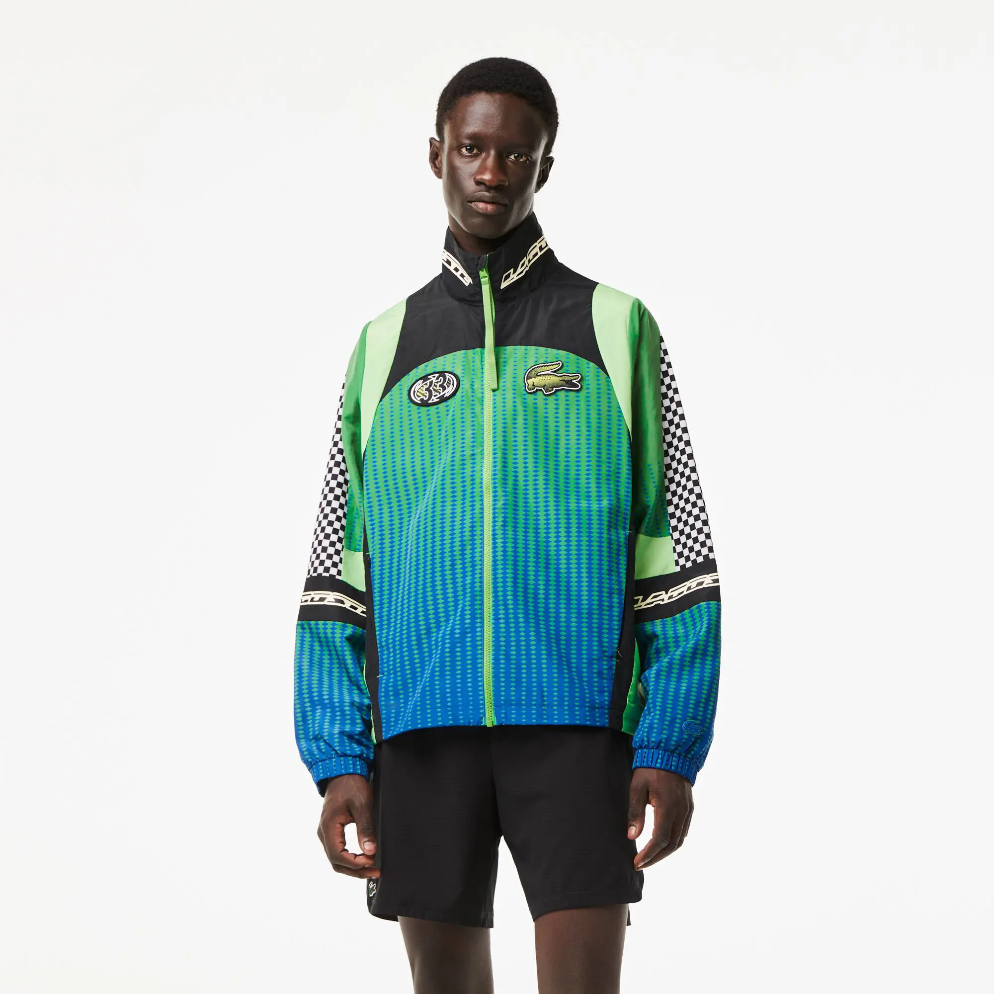 Lacoste Herren LACOSTE Trainingsjacke mit Ombré-Schachbrettmuster. 1 Lacoste Herren LACOSTE Trainingsjacke mit Ombré-Schachbrettmuster. 1
