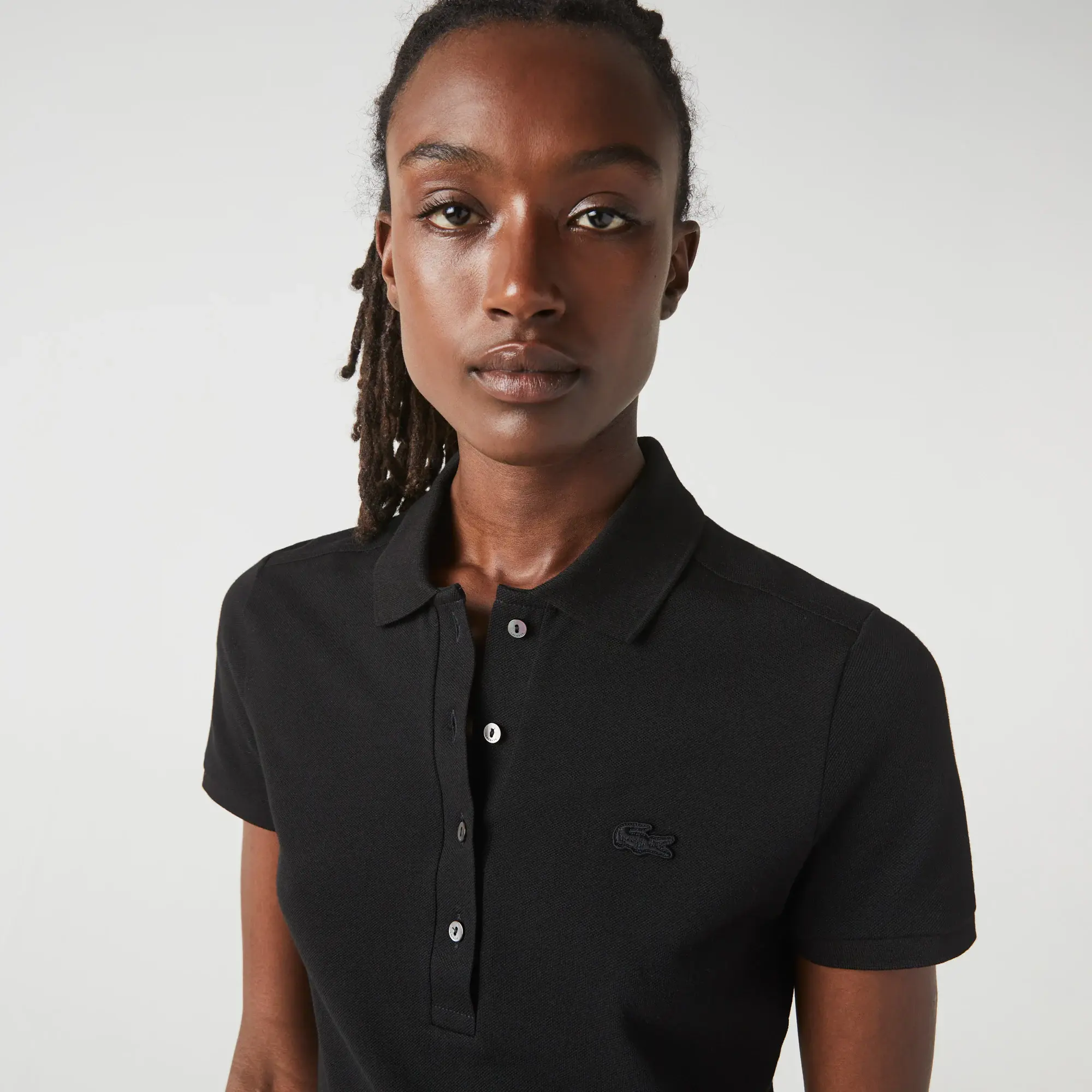Lacoste Women's Slim Fit Stretch Cotton Piqué Polo. 1 Lacoste Women's Slim Fit Stretch Cotton Piqué Polo. 1