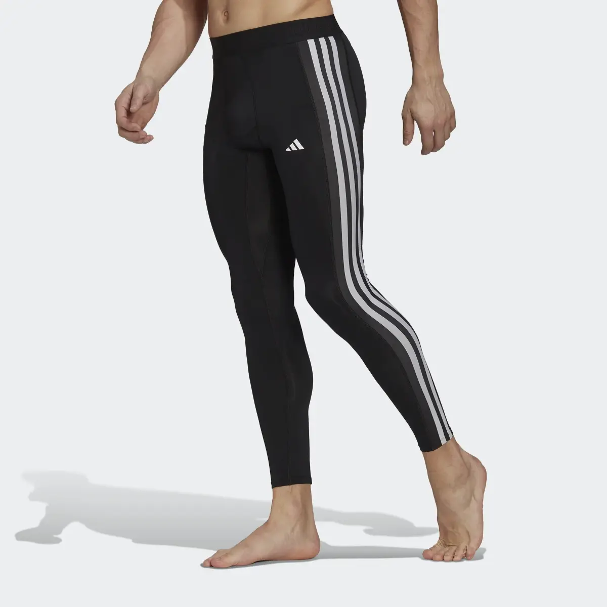 Adidas Leggings lunghi da allenamento Techfit 3-Stripes. 1