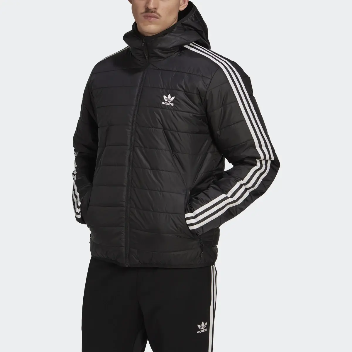 Adidas Chaqueta acolchada con capucha Puffer. 1