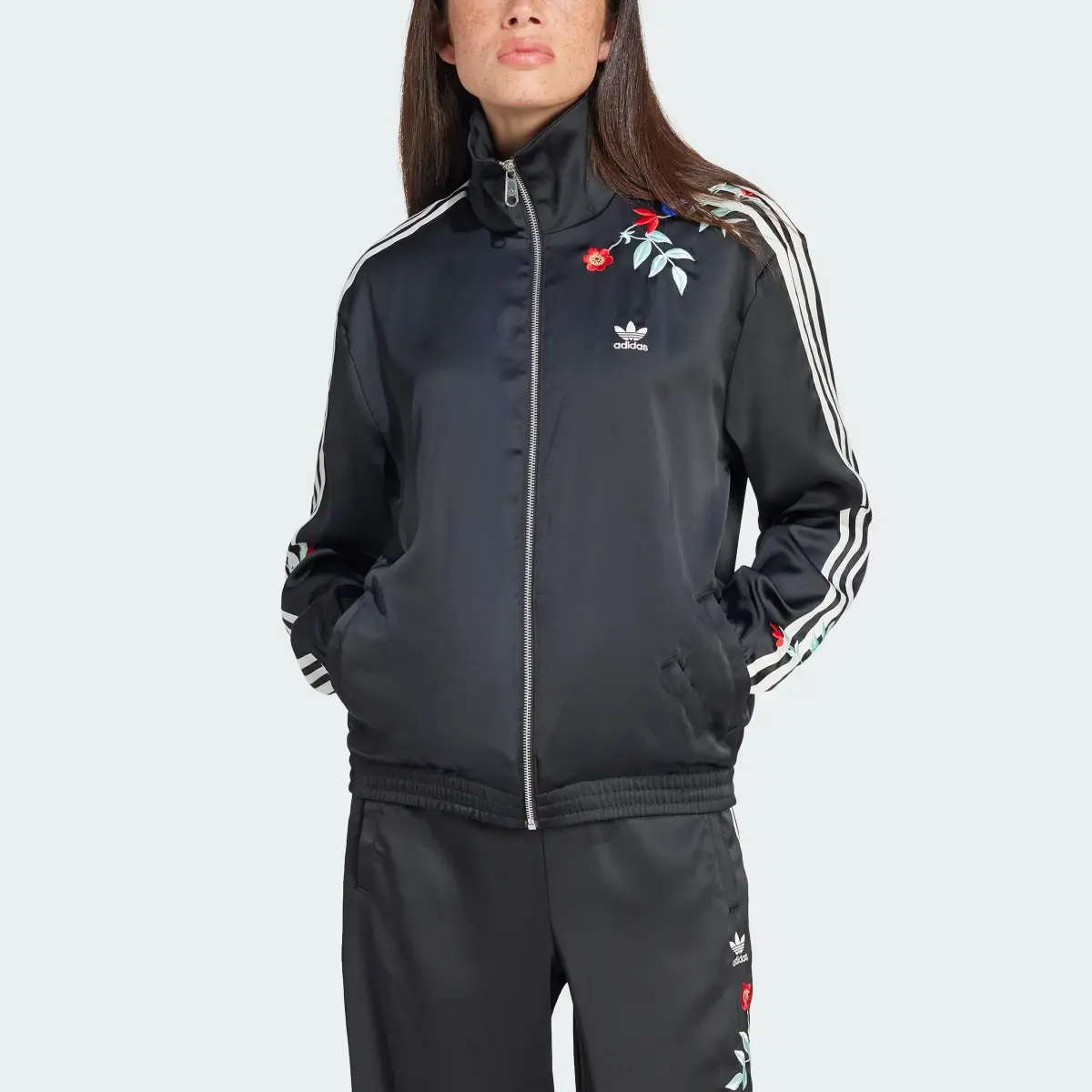 Adidas Chamarra Deportiva Firebird Floral Estampada. 1