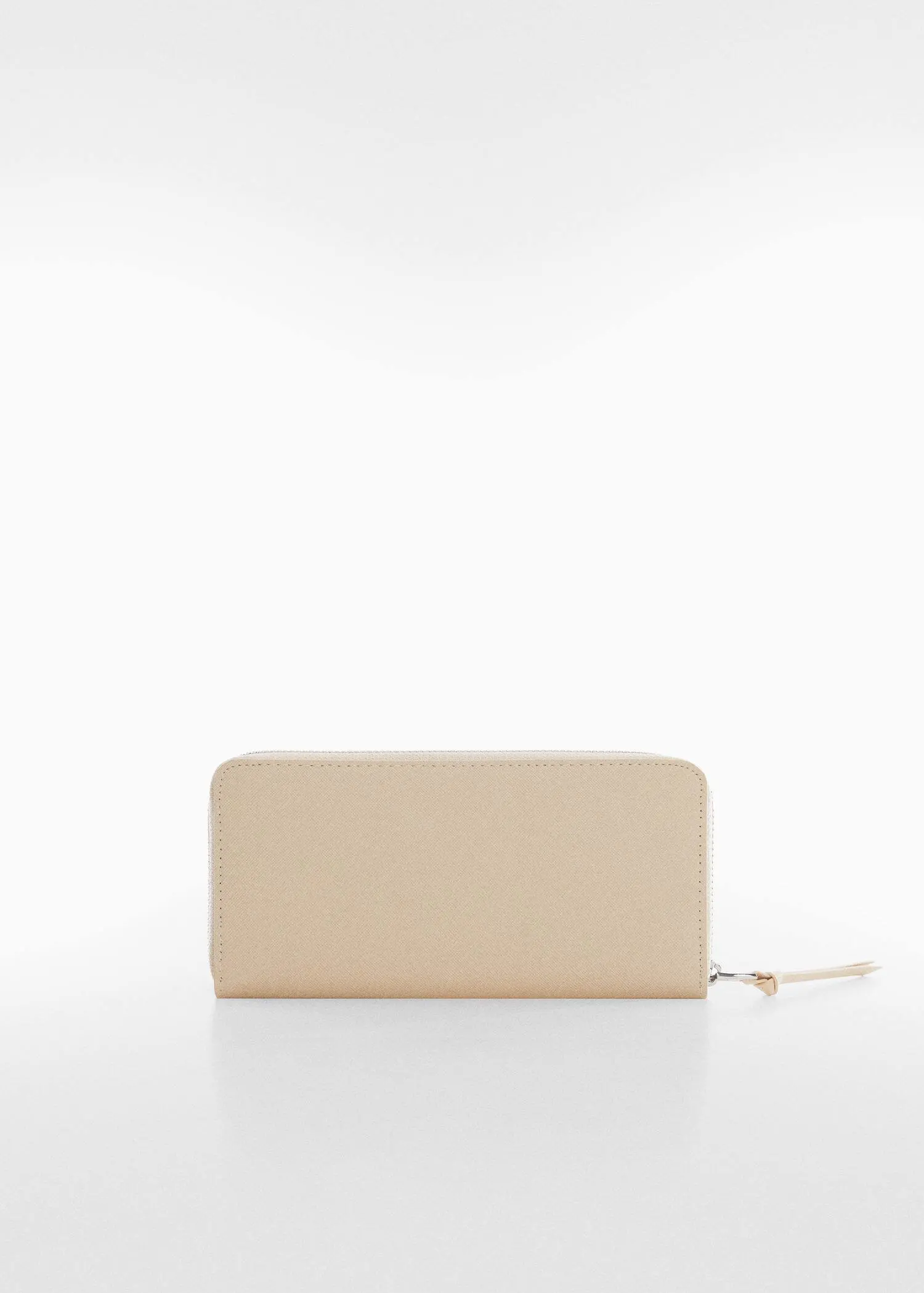 Mango Saffiano-effect wallet. a beige purse sitting on top of a table. 