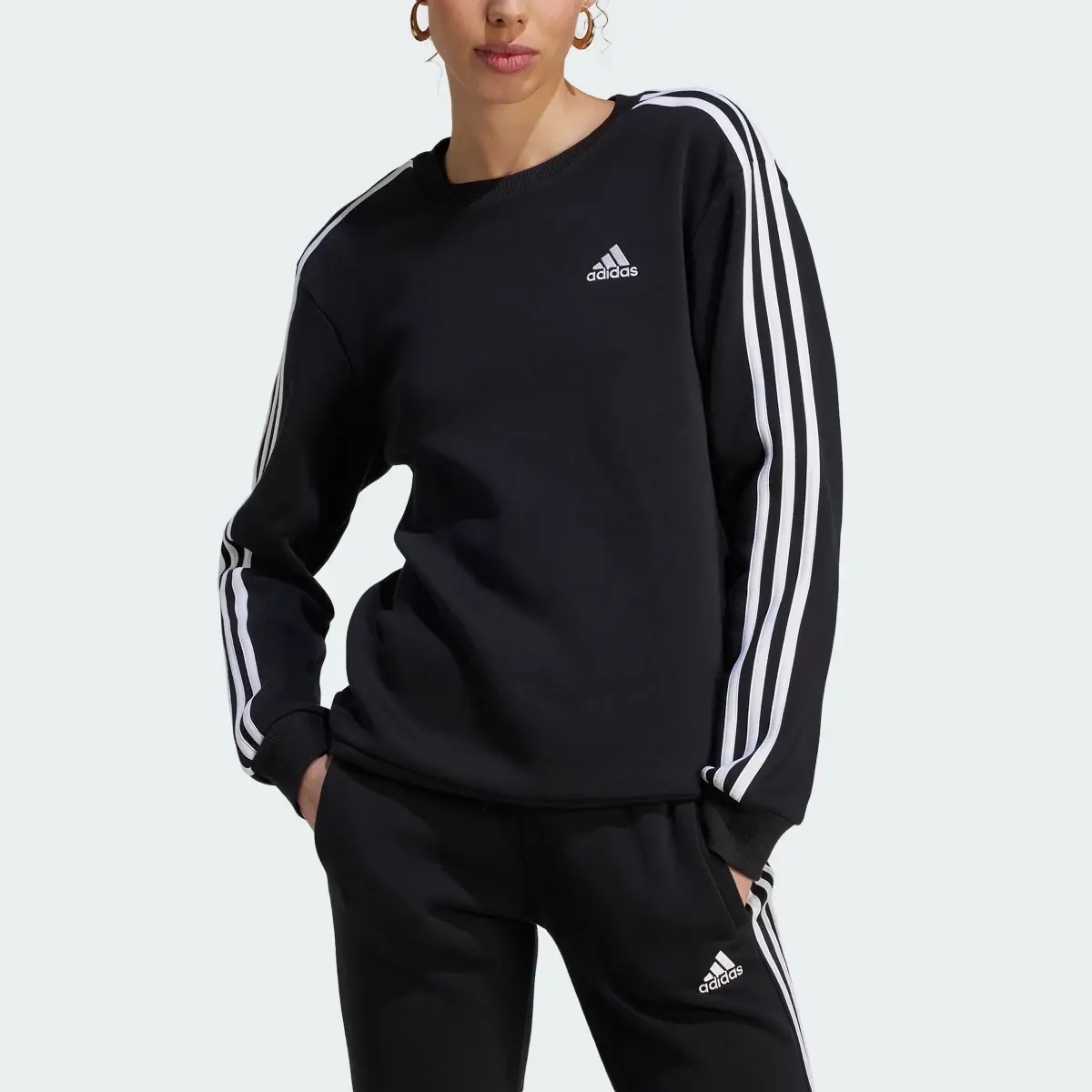 Adidas Essentials 3-Stripes Fleece Sweatshirt. 1