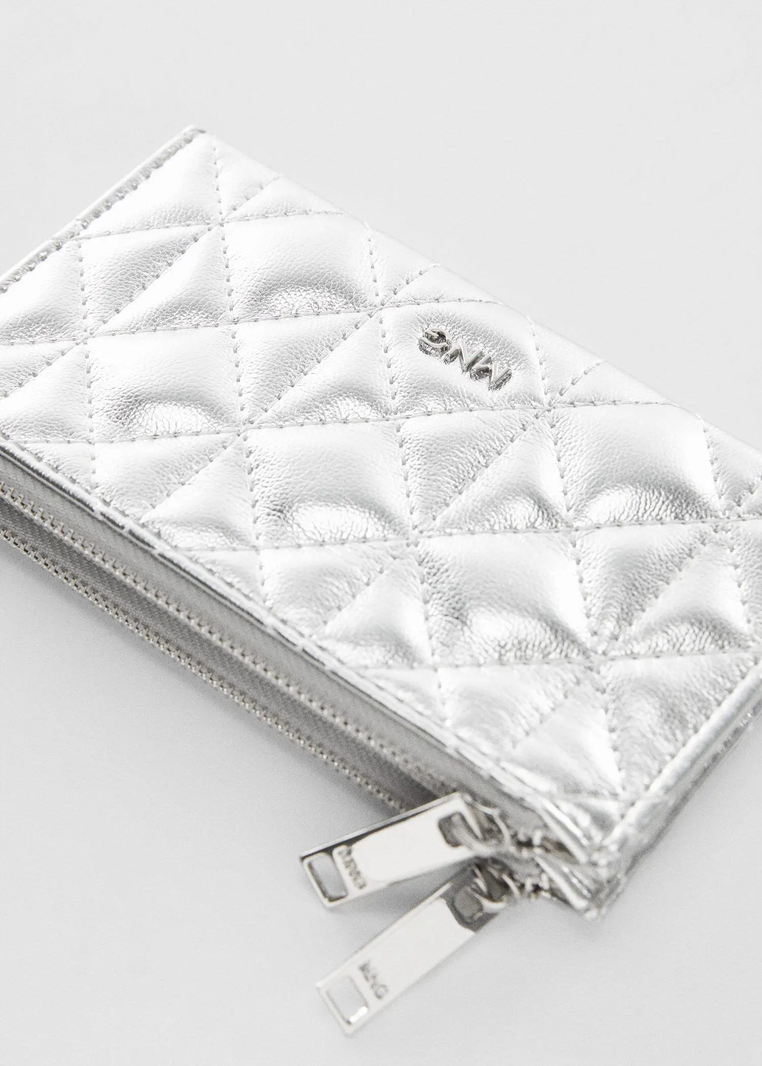 Mango Quilted purse with logo. 2