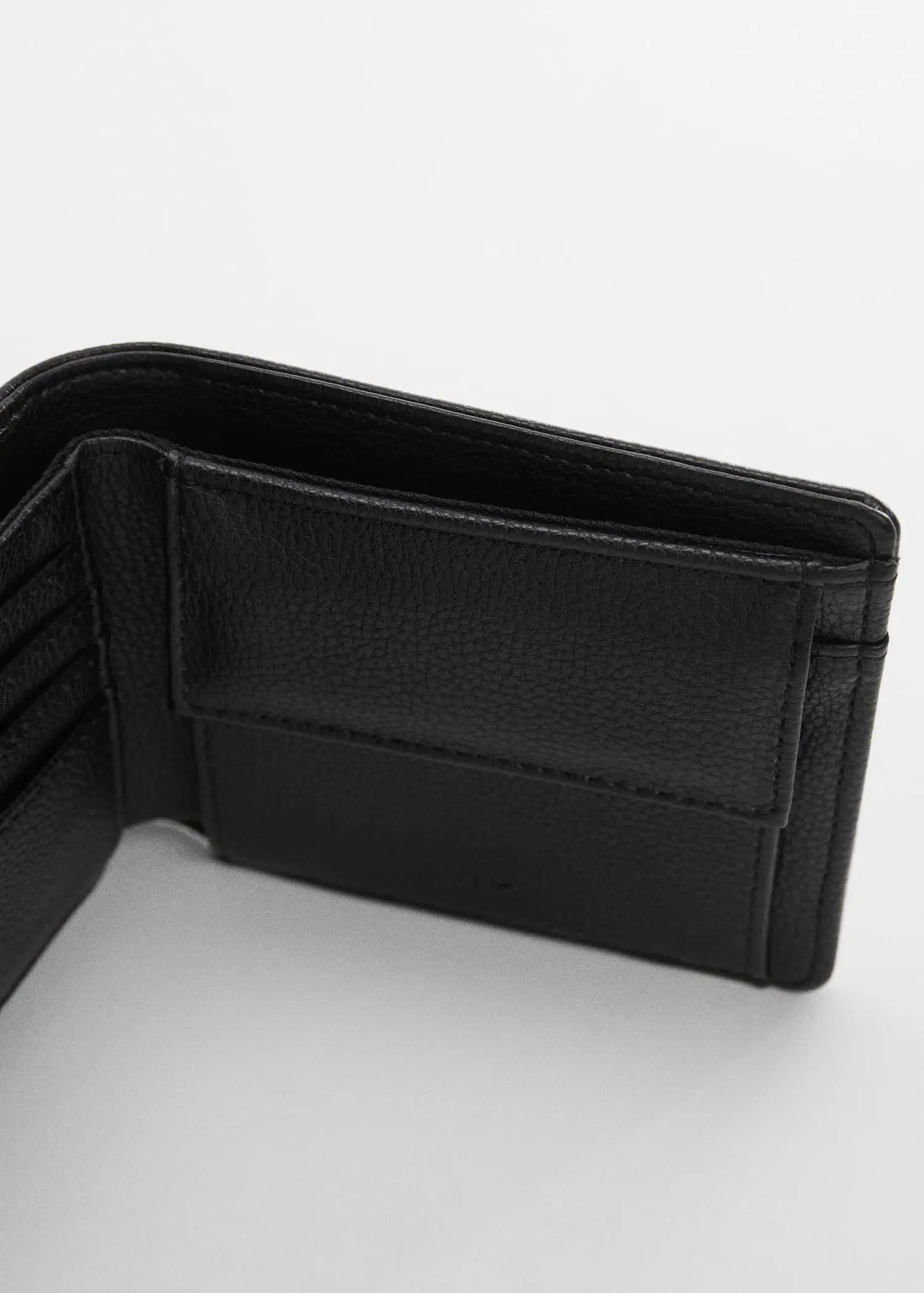 Mango Anti-contactless wallet. a close-up of the inside of a black wallet. 