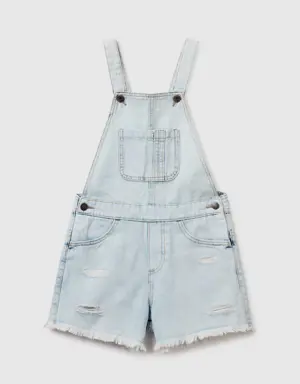 denim dungarees with rips