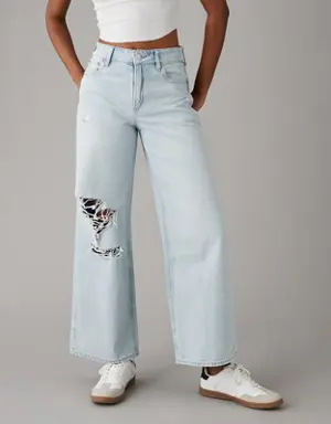 Strigid Super High-Waisted Baggy Wide-Leg Ripped Ankle Jean