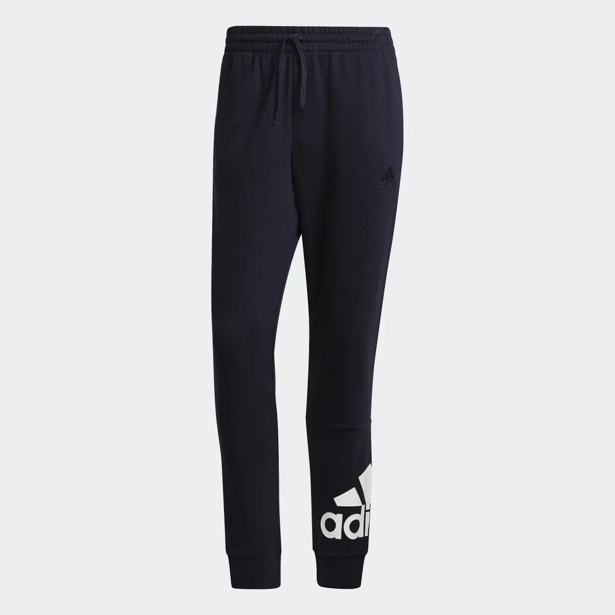 Adidas Essentials French Terry Tapered Cuff Logo Joggers. 1