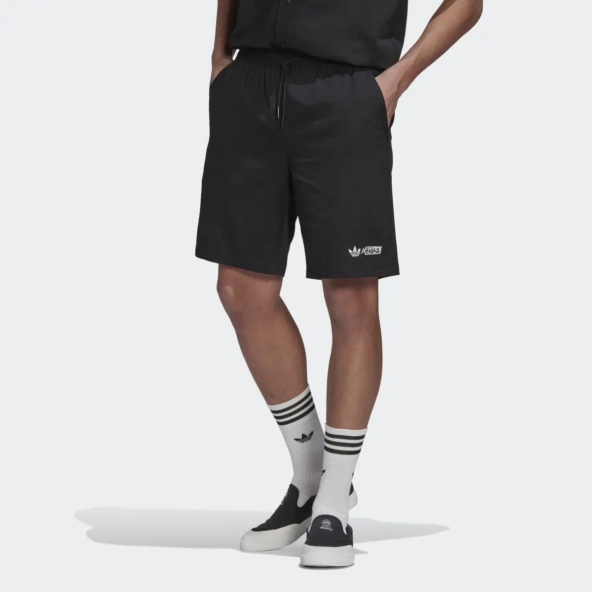 Adidas Twill Shorts. 1