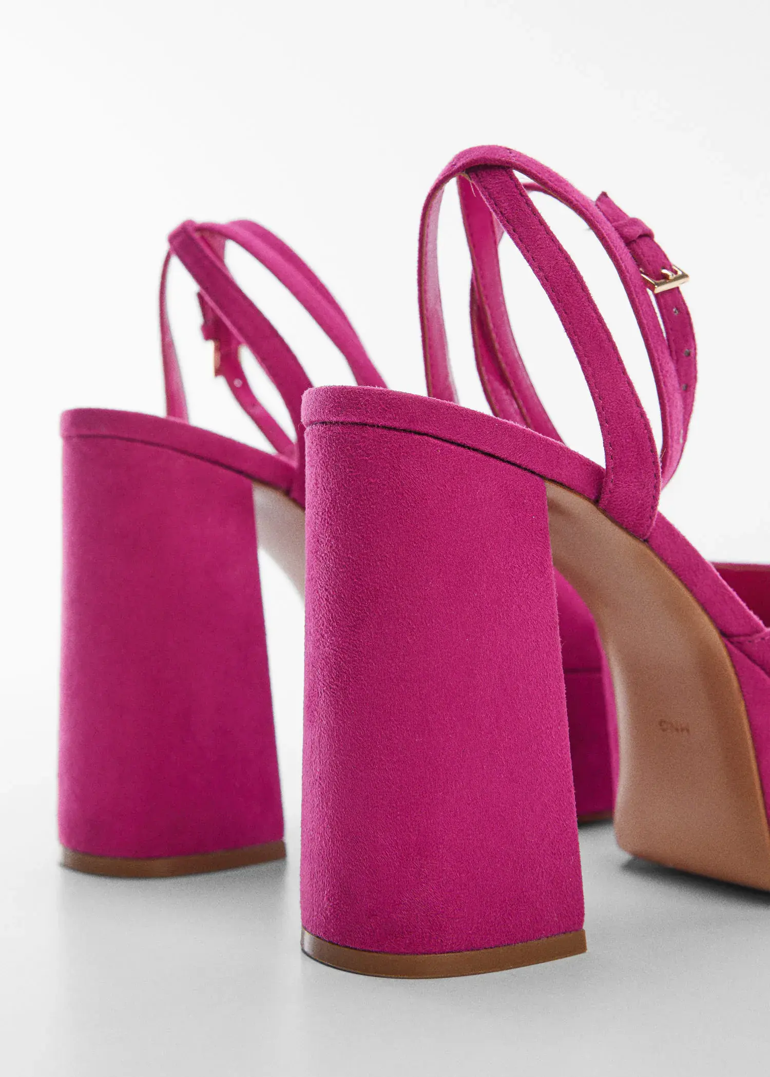 Mango Platform ankle-cuff sandals. a close up of a pair of pink high heels. 
