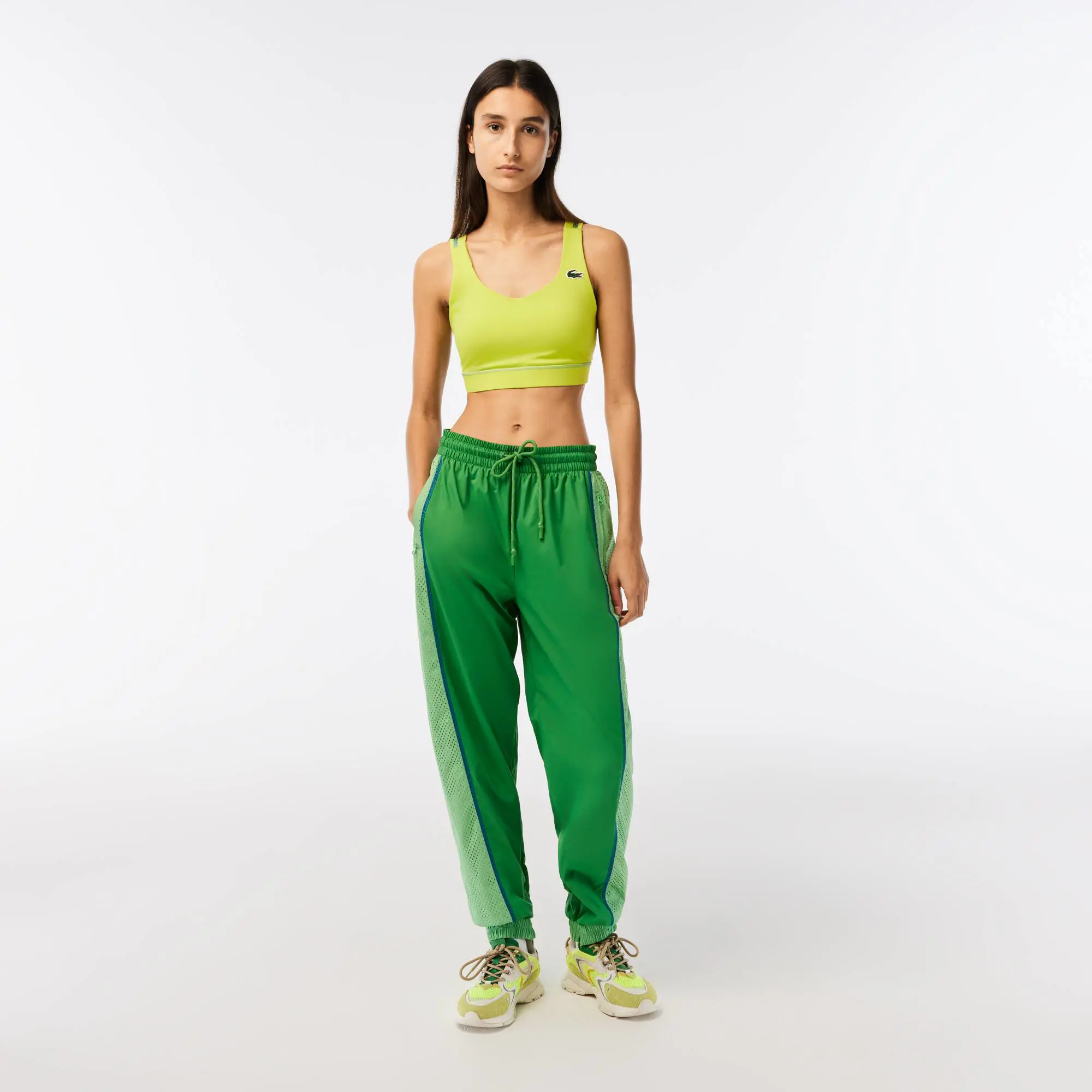 Lacoste Women’s Lacoste Perforated Effect Track Pants. 1