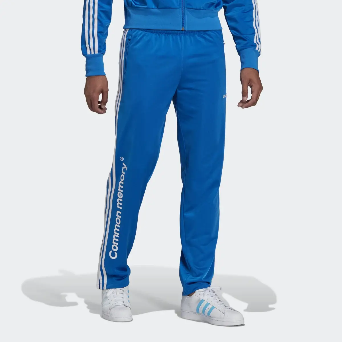 Adidas Graphic Common Memory Tracksuit Bottoms. 1
