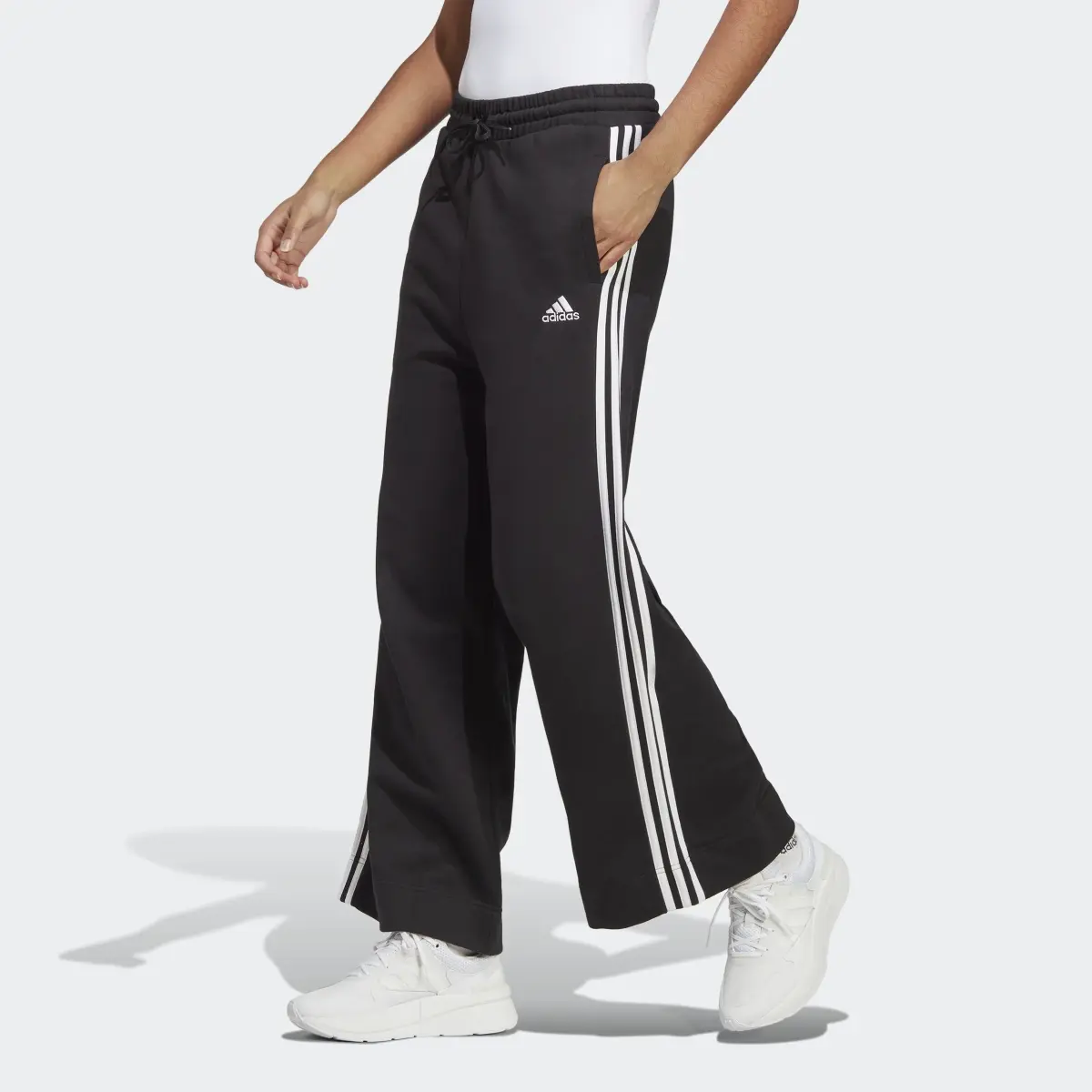 Adidas Pantaloni Essentials 3-Stripes French Terry Wide. 1