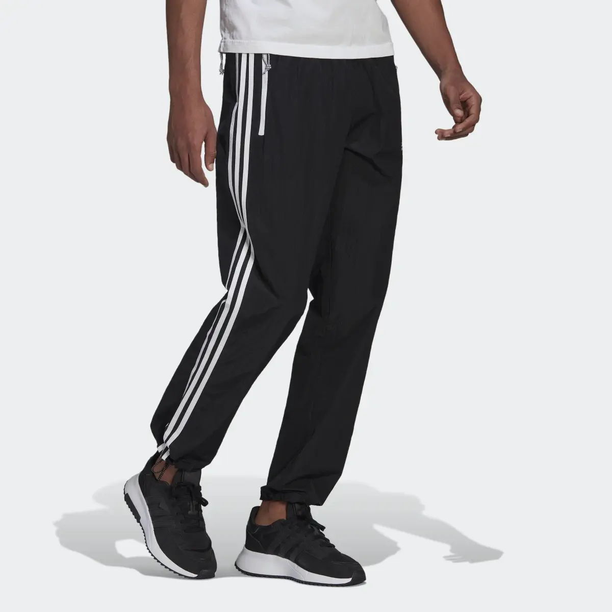 Adidas Adventure Track Pants. 3