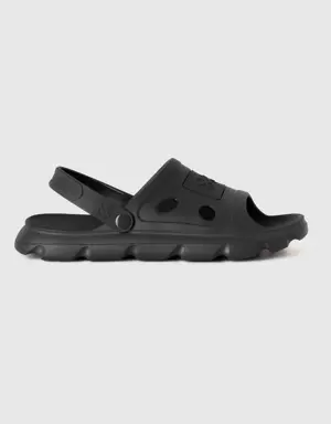 black sandals in lightweight rubber