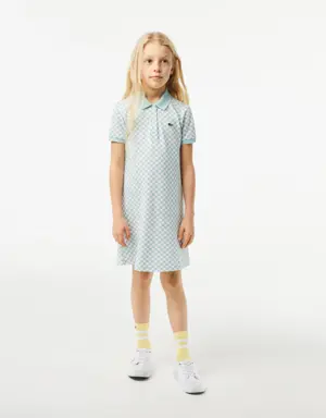 Vestido polo de niña Lacoste con estampado de cuadros en algodón ecológico