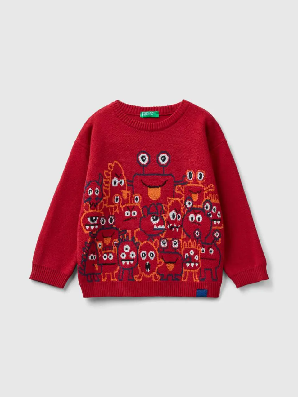 Benetton sweater with monster graphics. 1