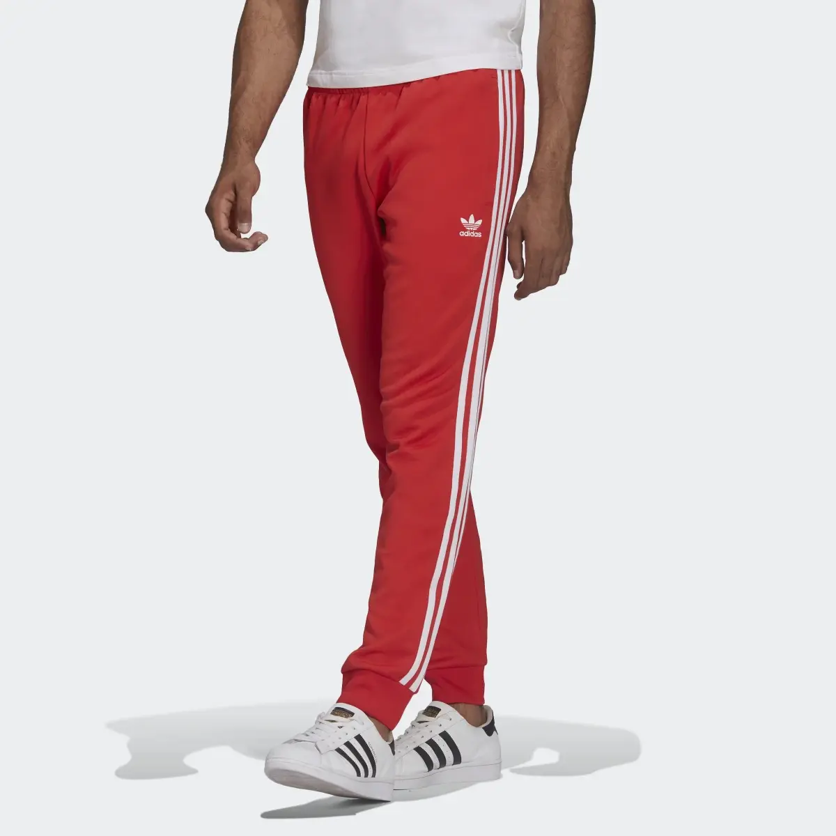 Adidas ADICOLOR CLASSICS PRIMEBLUE SST TRACK PANTS. 1