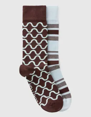 two pairs of gray and dark brown socks