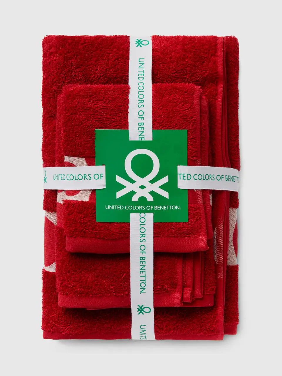 Benetton red towel set with polka dot edge. 1