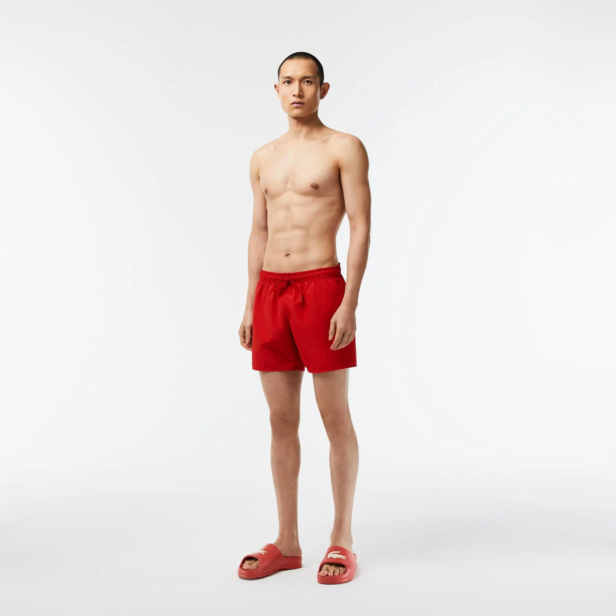 Lacoste Men's Light Quick-Dry Swim Shorts. 1 Lacoste Men's Light Quick-Dry Swim Shorts. 1