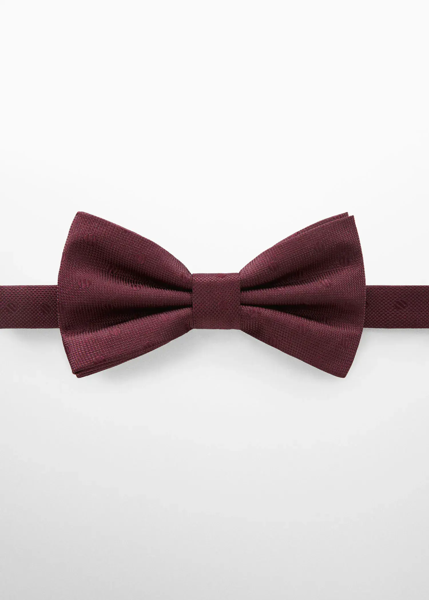 Mango Bow tie with polka-dot structure. a maroon bow tie on a white background. 