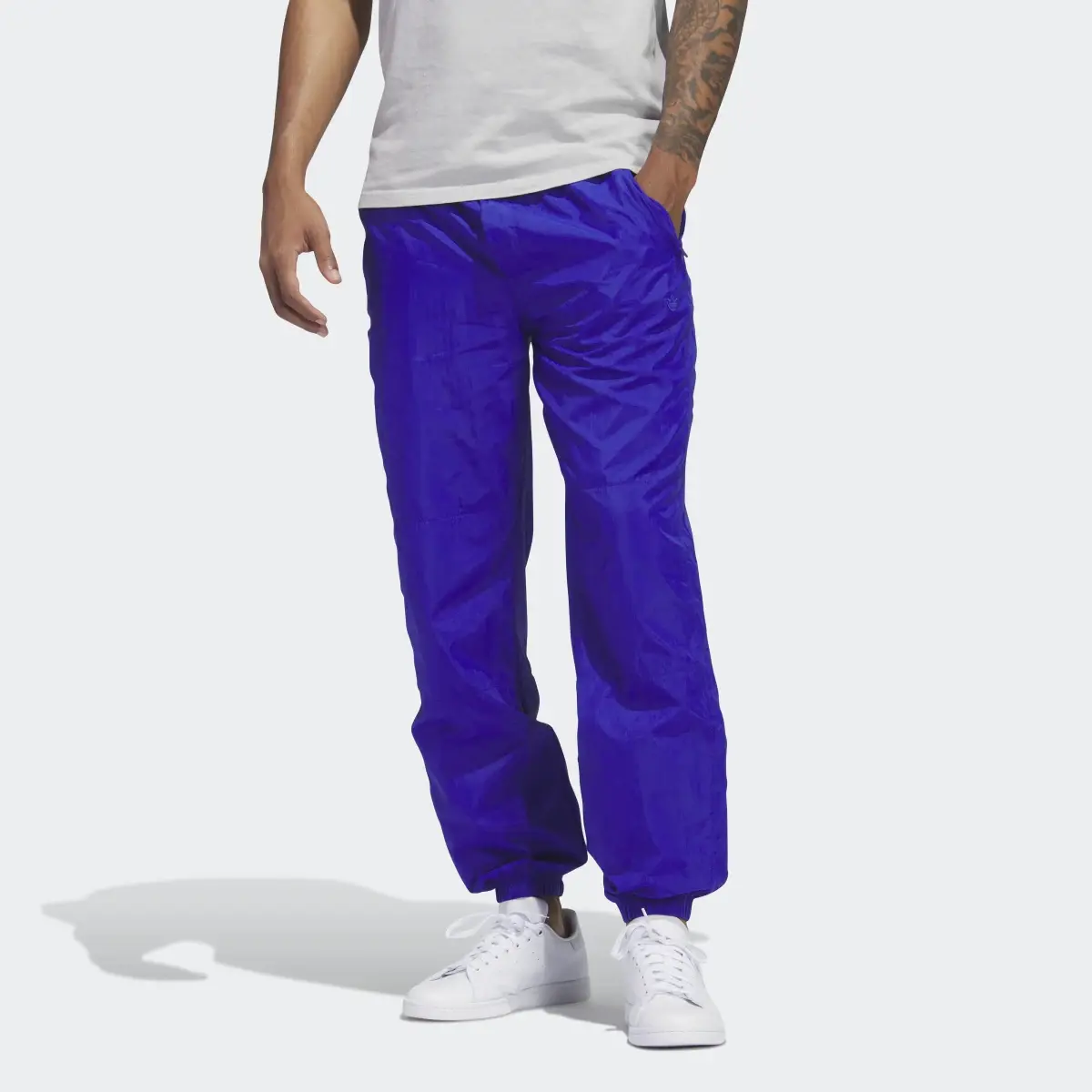 Adidas Pantalón Premium Essentials Crinkle Nylon. 1