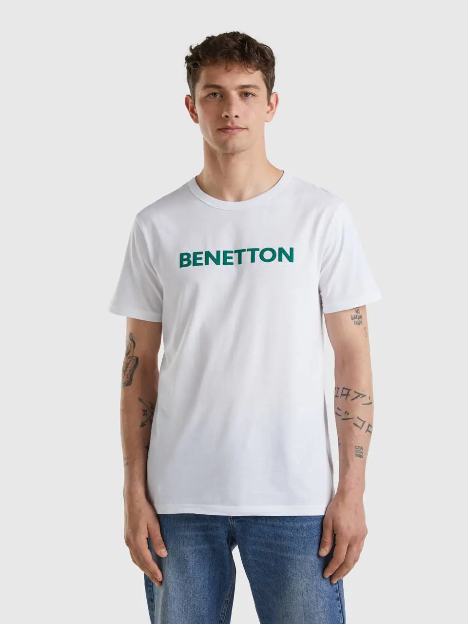 Benetton white t-shirt in organic cotton with green logo. 1