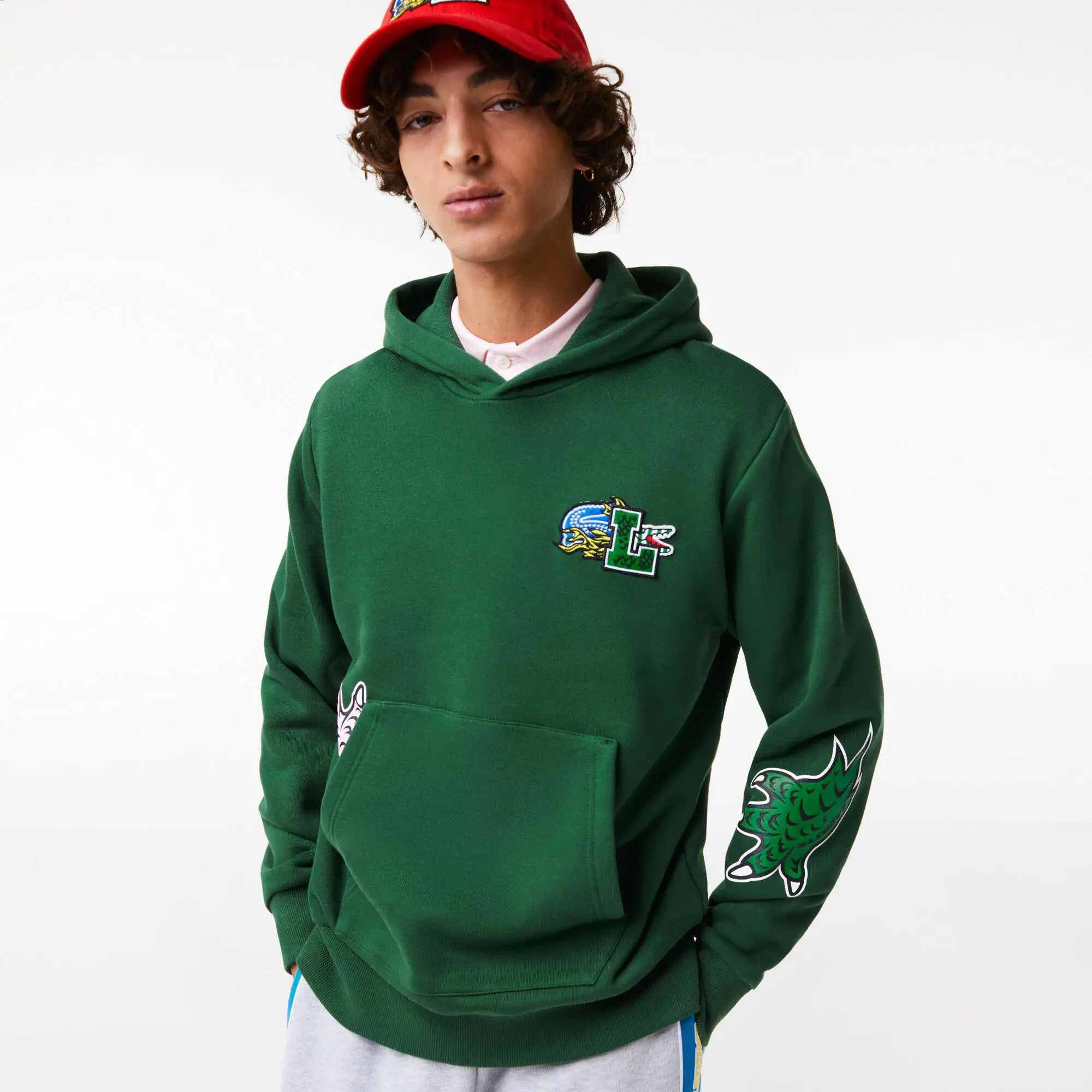 Lacoste Sweatshirt à capuche homme Lacoste Holiday avec imprimés effet BD. 1