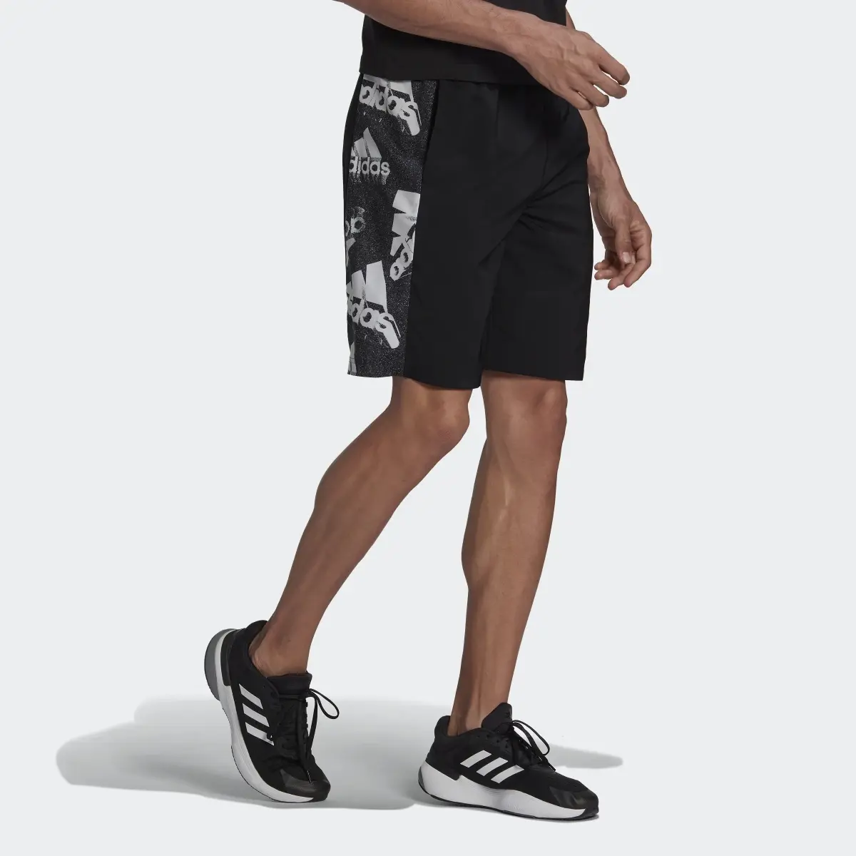 Adidas Essentials BrandLove Woven Shorts. 3