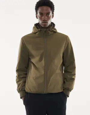 Water-repellent hooded quilted jacket