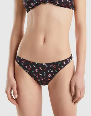 black swim bottoms with floral print