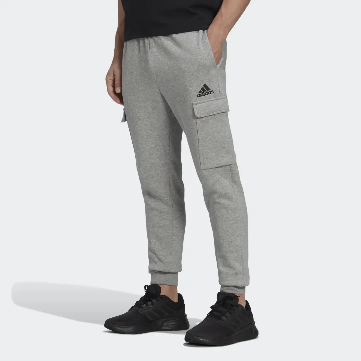 Adidas Essentials Fleece Regular Tapered Cargo Pants. 1