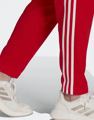 Adidas Essentials 3-Stripes Track Suit. 3 Adidas Essentials 3-Stripes Track Suit. 3