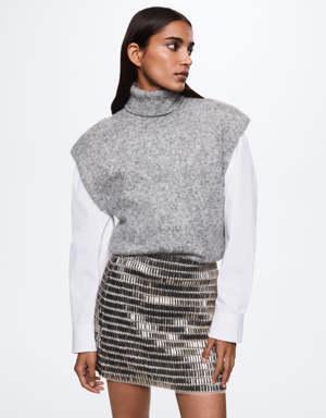 Knitted gilet with shoulder pads