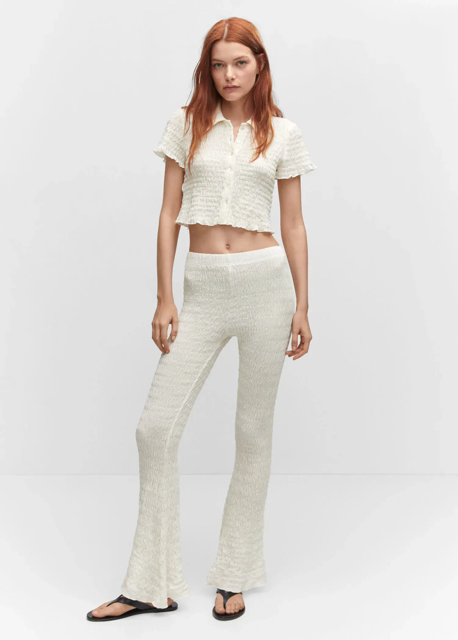 Mango Flared textured trousers. 2