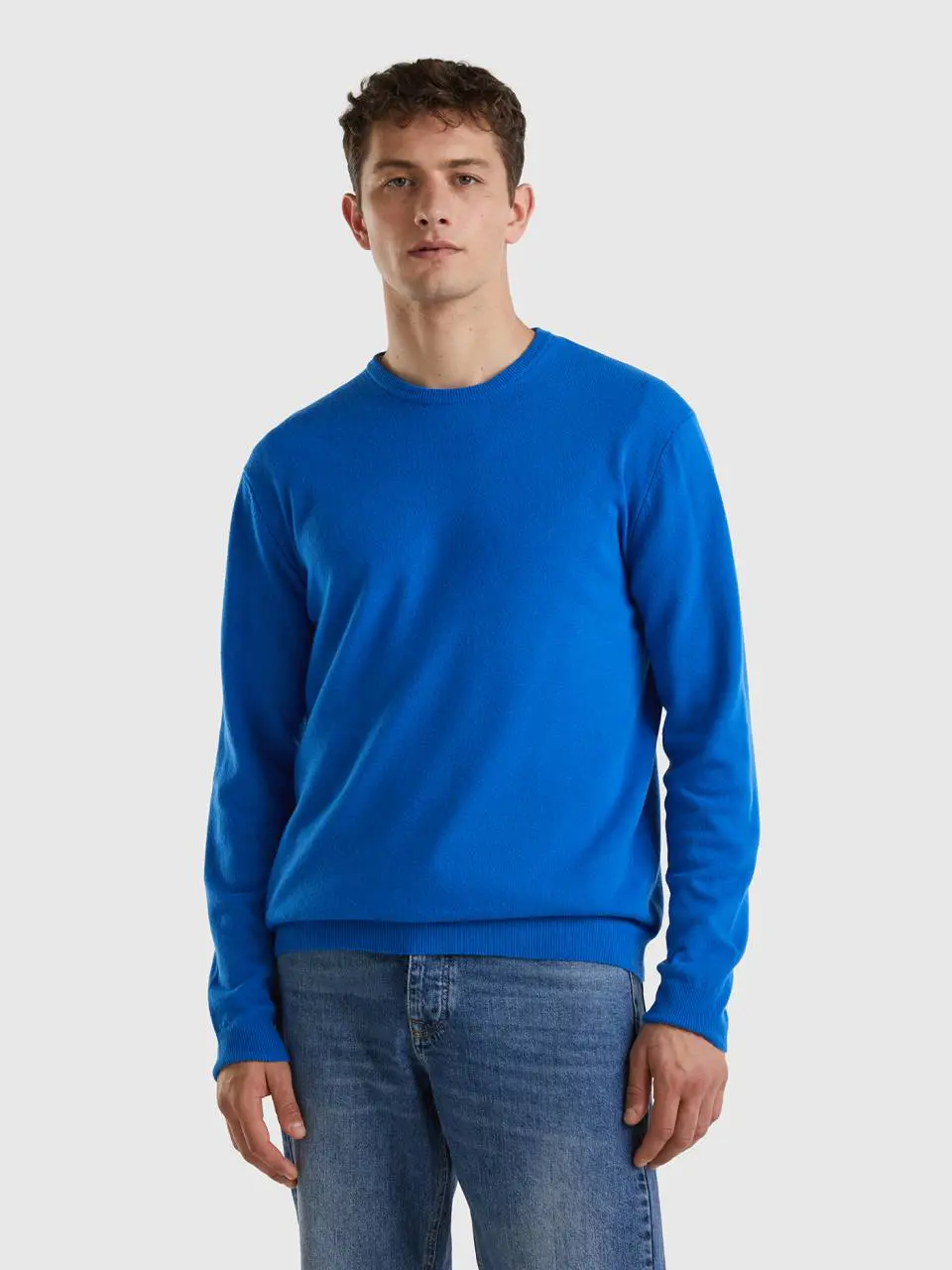 Benetton cornflower blue crew neck sweater in pure merino wool. 1